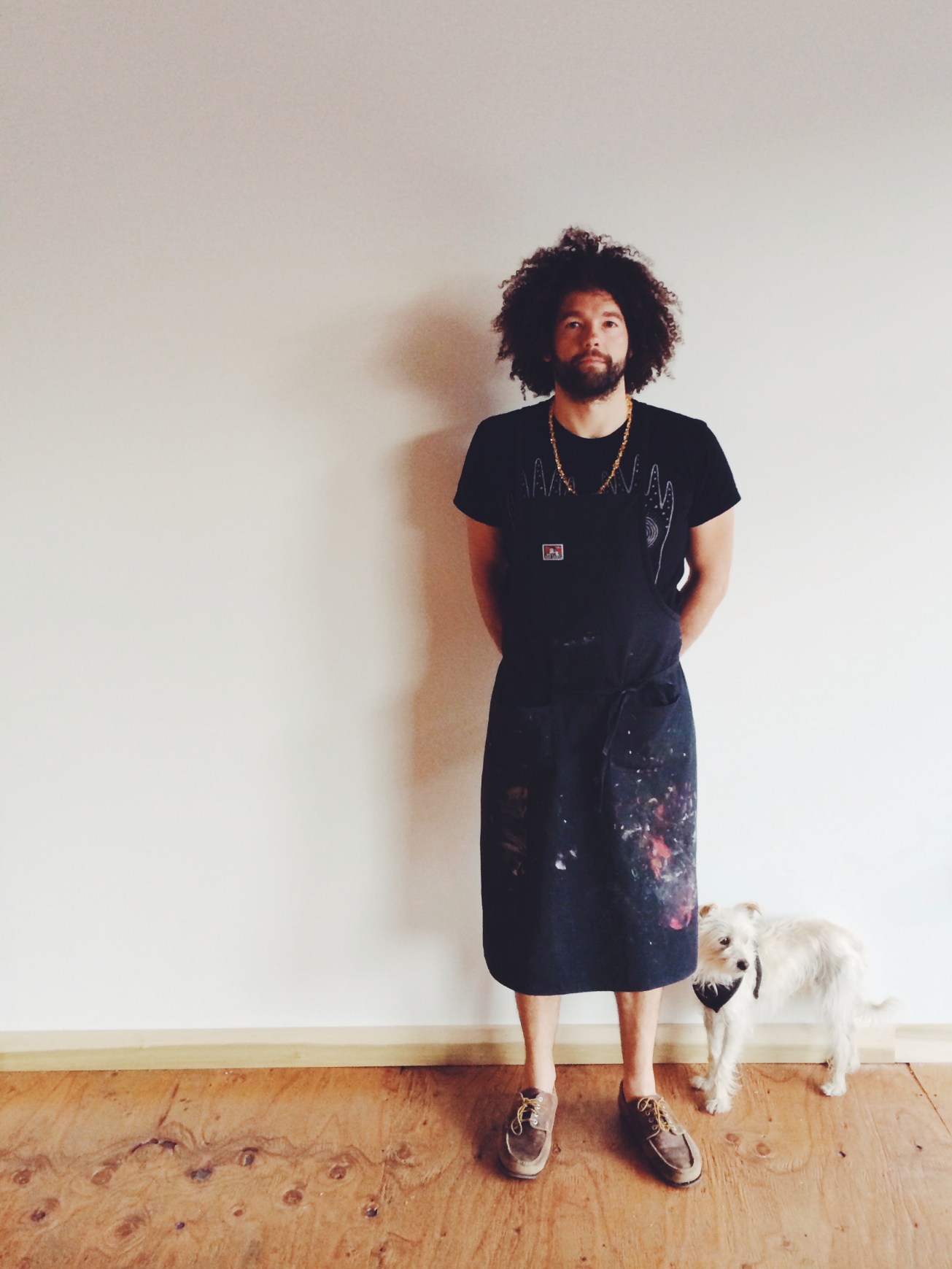 Adam and Donut against the beautiful white wall