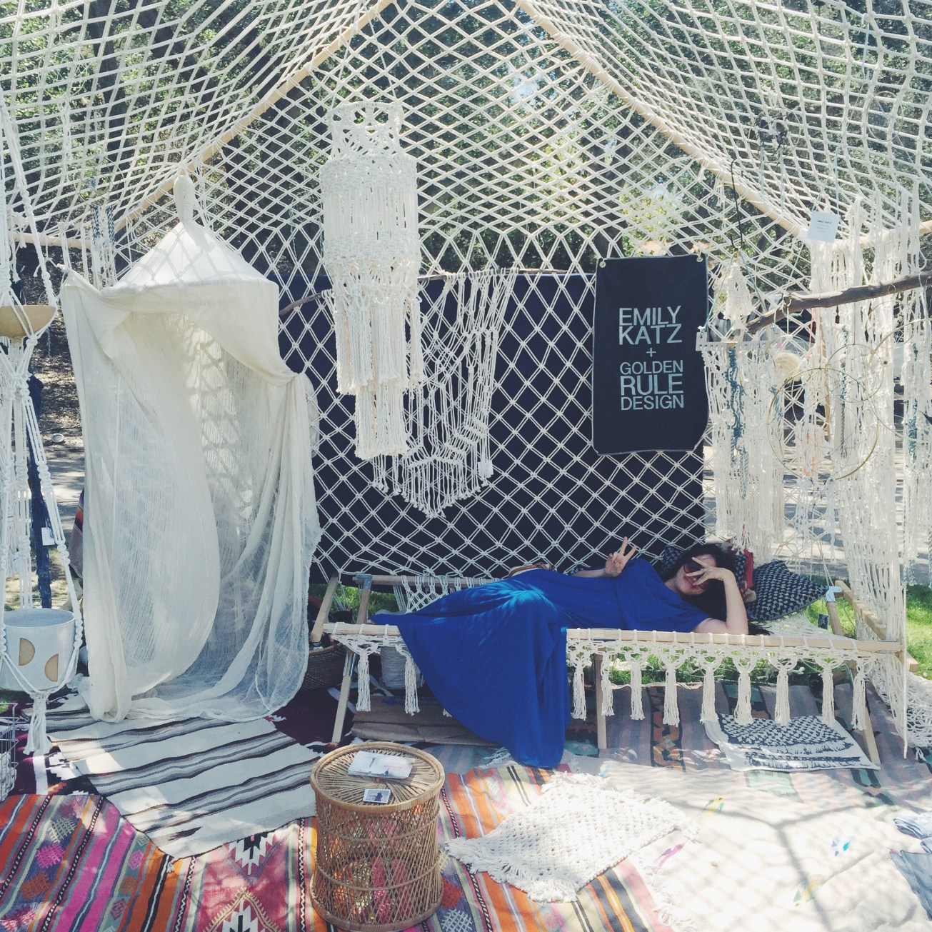 Brisa lounging in the Macrame tent