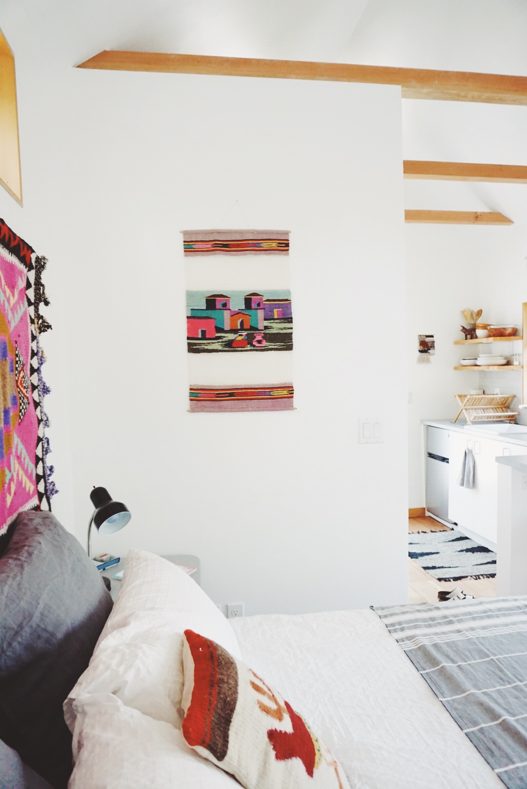a cozy room in a tiny house designed by Emily Katz