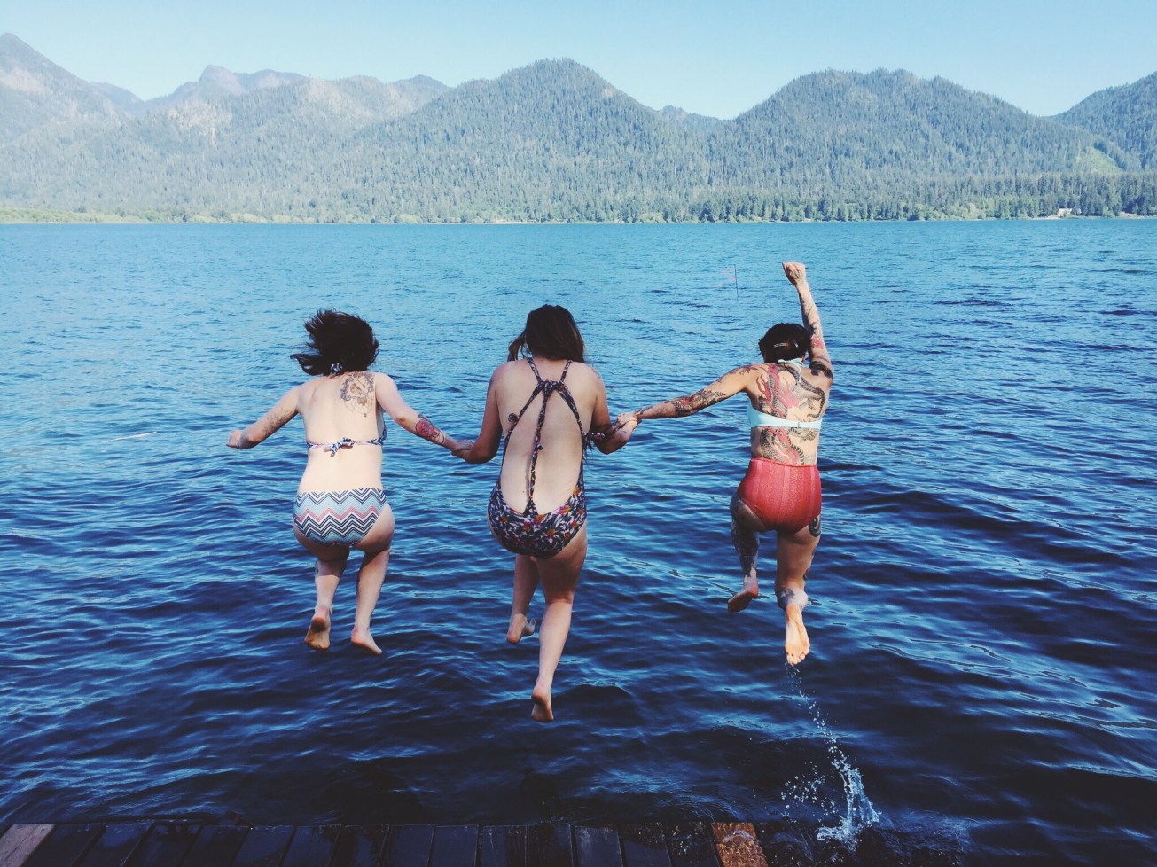 Freedom! jumping into lake quinalt-magicdreamlife